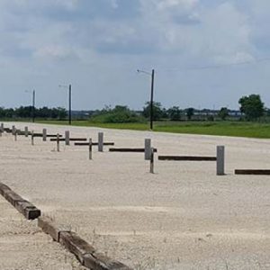 Drainage issues plague a lot of RV parks – Not Lost Shoe, we invested in a thick mat of gravel compacted to ensure our guests a dry space.