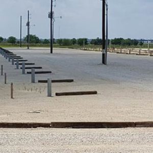 Drainage issues plague a lot of RV parks – Not Lost Shoe, we invested in a thick mat of gravel compacted to ensure our guests a dry space.